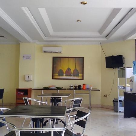 Quint Hotel Manado Exterior foto